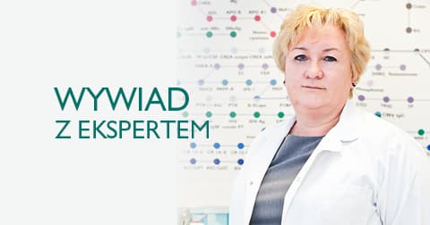 Ręka laboranta trzymająca probówki